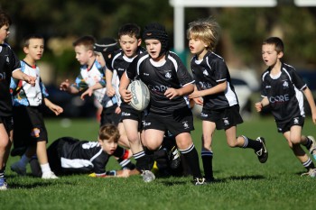 Young kids play rugby at Nagle Park on June 18, 2011 in Sydney, Australia.